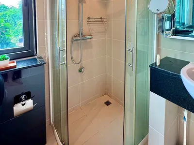 ภายในห้องน้ำในคอนโด 2 ห้องนอนที่ Himma Garden Condominium เชียงใหม่