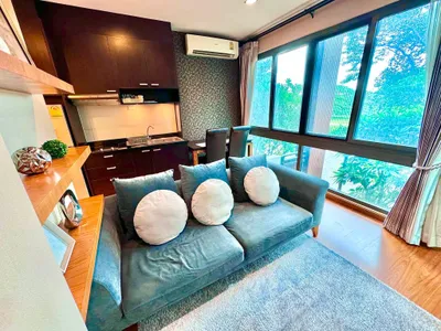 Living room of a 2-bedroom condo at Himma Garden Condominium in Chiang Mai